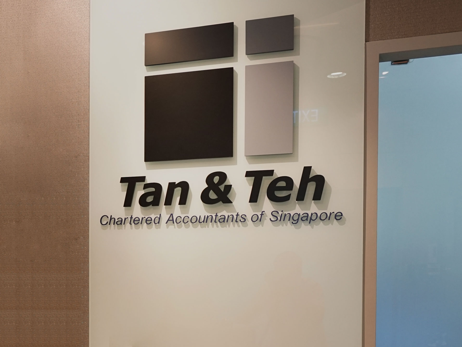 https://www.tanandteh.com.sg/sites/default/files/revslider/image/slide-tat-lobby-signage.jpg